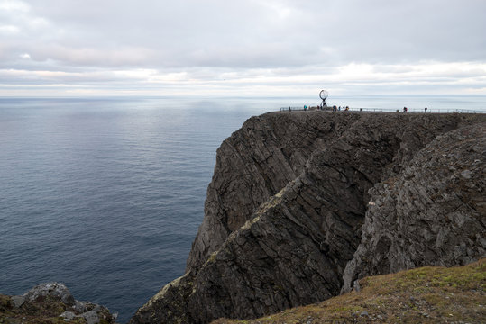 norwegian north cape monument, with people tourists making pictures, norway, europe