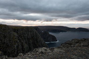 norwegian north cape with mountains and water, view from the top to the coast, norway, europe, sunset