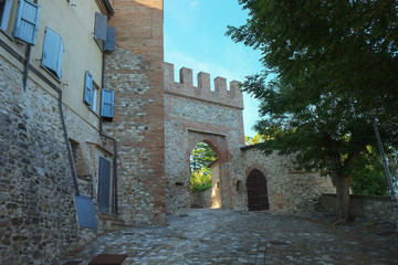 Medieval fortress walls and gates in Montecolombo, Italy