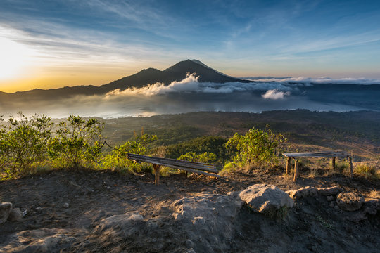 Sunrise from gunung batur with view to gunung agung mountain in bali indonesia