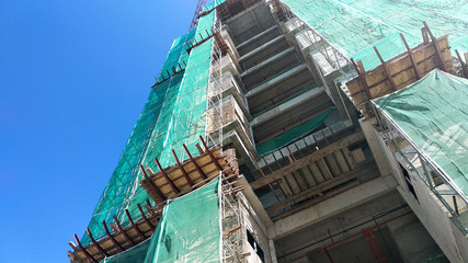 Catch platform or other construction projection from the face of a building. It is protect individuals and property from falling debris during construction. 