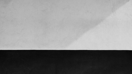 white wall with shadows from the window.