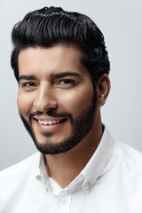 Obraz premium Hair And Beard. Beautiful Smiling Man With Hair Style