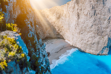 Navagio beach Zakynthos with shipwreck in the warm morning light. Greece