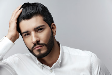 Man With Hair Style, Beard And Beauty Face Fashion Portrait Stock Photo |  Adobe Stock