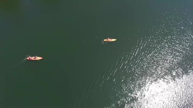 Aerial View of People Kayaking and Paddle Boarding on the Ladybird Lake, Austin, Texas