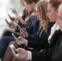 closeup of colleagues sitting at a business conference.