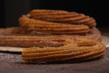 Churros fritos en manteca