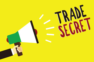 Text sign showing Trade Secret. Conceptual photo Confidential information about a product Intellectual property Man holding megaphone loudspeaker yellow background message speaking loud