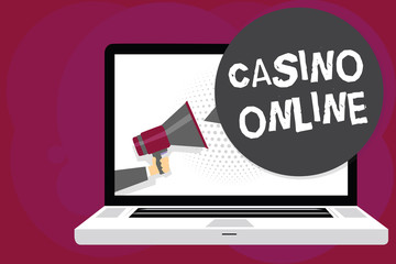Writing note showing Casino Online. Business photo showcasing Computer Poker Game Gamble Royal Bet Lotto High Stakes Man holding Megaphone computer screen talking speech bubble
