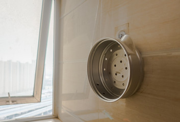 Kitchen Pot Hanging on Wall Tile Alone Idle