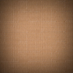 Brown fabric background.
