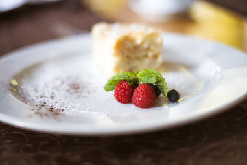 Defocus macro Layered cake Napoleon with berries