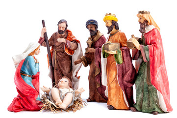Christmas nativity scene with the Holy Family and the three wise men, isolated on white background