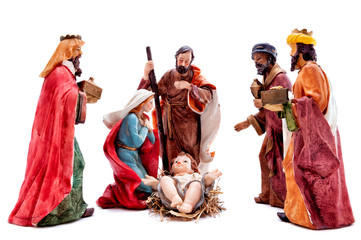Christmas nativity scene with the Holy Family and the three wise men, isolated on white background