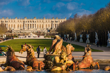 Fountain of Apollo at the garden of the Versailles Palace in a freezing winter day just before...