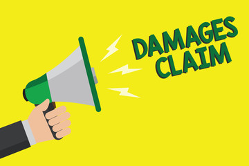 Text sign showing Damages Claim. Conceptual photo Demand Compensation Litigate Insurance File Suit Man holding megaphone loudspeaker yellow background message speaking loud