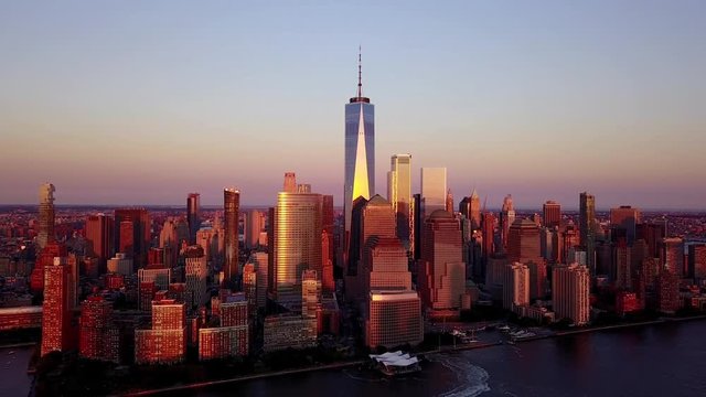 Sunset in New York City. Drone flyover lower Manhattan