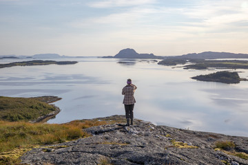 Fototapeta na wymiar Happy walking in Norwegian mountain Nordland county 