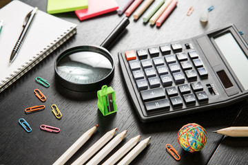 Back to school concept. School and office supplies on office table