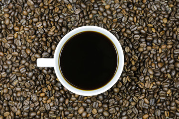 Coffee beans and coffee cups in the morning.