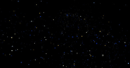 Flying dust particles on a black background