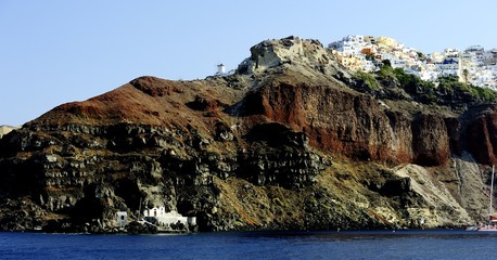 White houses clinging to the cliff tops