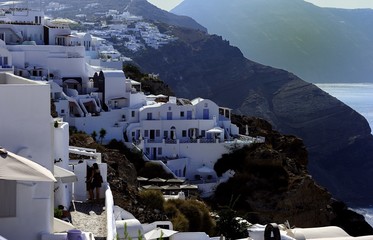 White houses clinging to the cliff tops