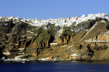 White houses clinging to the cliff tops