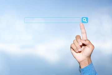 Finger clicking browser search bar on sky background