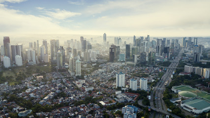 Fototapeta na wymiar Jakarta cityscape with air pollution at morning