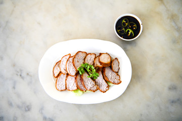 The fried chicken in a dish with cucumber,  eat with rice as foods that are beneficial to the body, Fast Food commonly eaten in the countries of Thailand