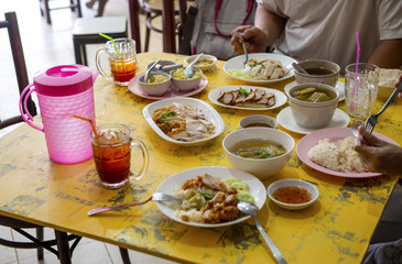 Fried chicken and Boiled chicken, Bitter soup with rice delicious breakfast prepared on the table to eat, Fast Food commonly eaten in the countries of Thailand