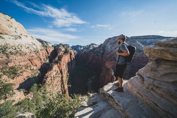 Young mans epic summit to Angels Landing trail - Zion National Park
