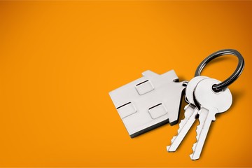 House shaped keychain and keys isolated on