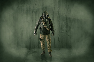 Dreadful dangerous man with wood, shanty wallpaper and fume around
