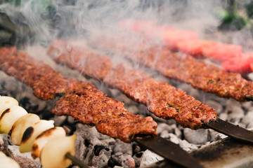 Turkish food Adana Kebab meat on the grill
