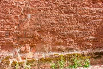 Hintergrund – alte verputzte  Natursteinmauer
