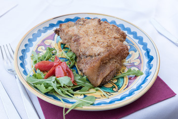 Cutlet with arugula