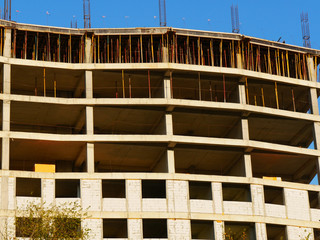  Concrete building under construction. Construction site.