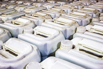 Plastic gallons , store agricultural pesticides, in a resale