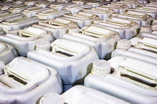 Plastic gallons , store agricultural pesticides, in a resale