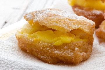 Handmade krapfen filled with pastry cream