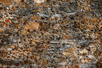 Traditional Paris region old stone wall, typical 