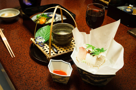 One of the many courses served during a ryokan dinner in Japan