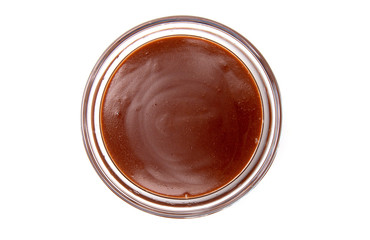 Single Bowl of Homemade Chocolate Pudding on a White Background