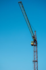 Crane with blue sky background