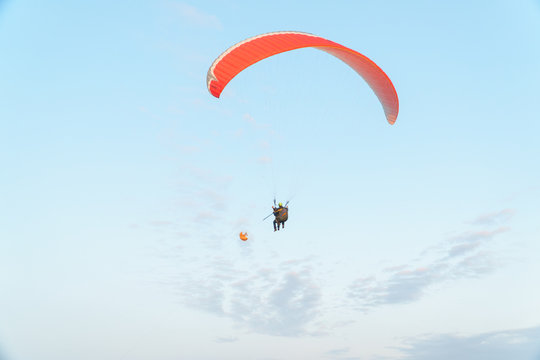Paraplane on the blue sky background, leisure activity.