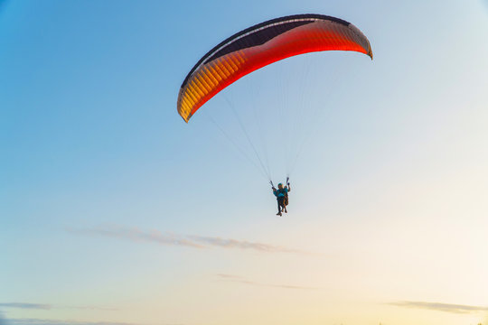 Paraplane on the blue sky background, leisure activity.