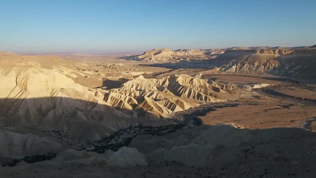Aerial footage at Sde Boker, in Neguev desert of Israel. Dry river in the desert landscape.